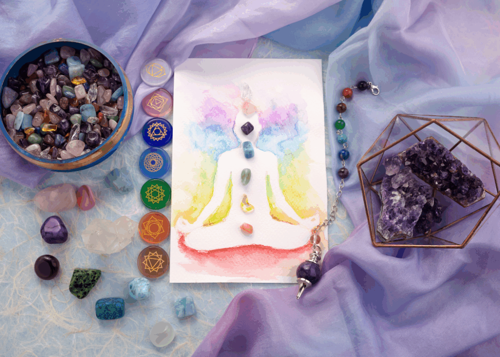 Tarot cards on top of the table along with other psychic stones
